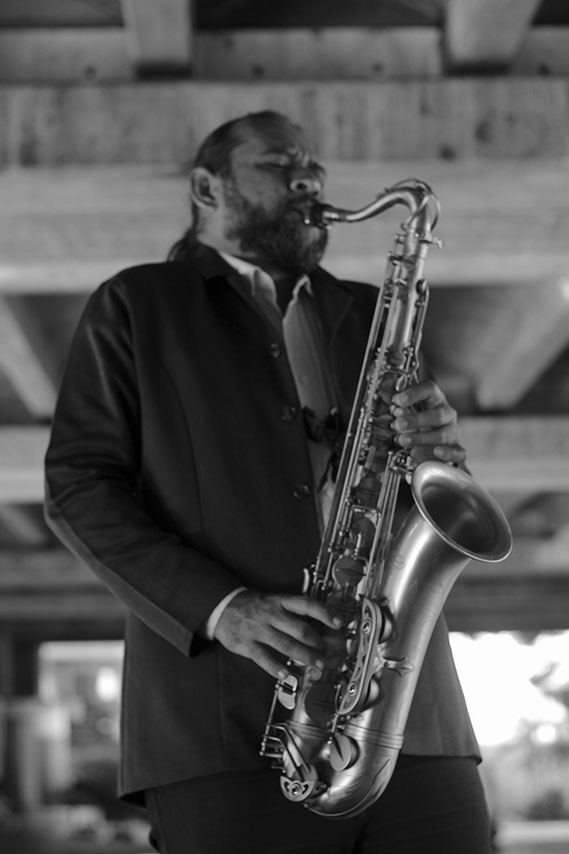 AGUSAX performing saxophone on stage